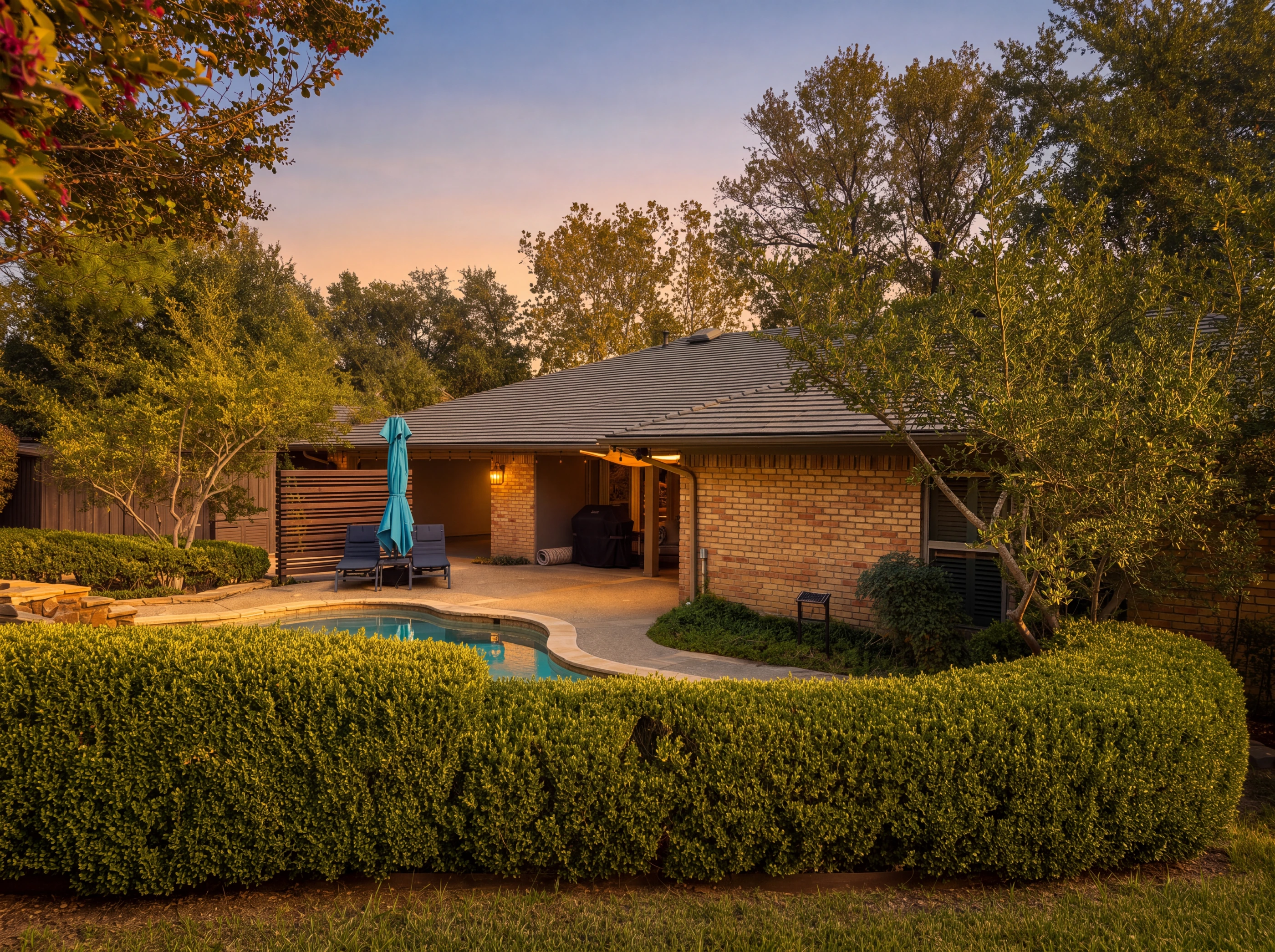 Pool and back of the house at dusk